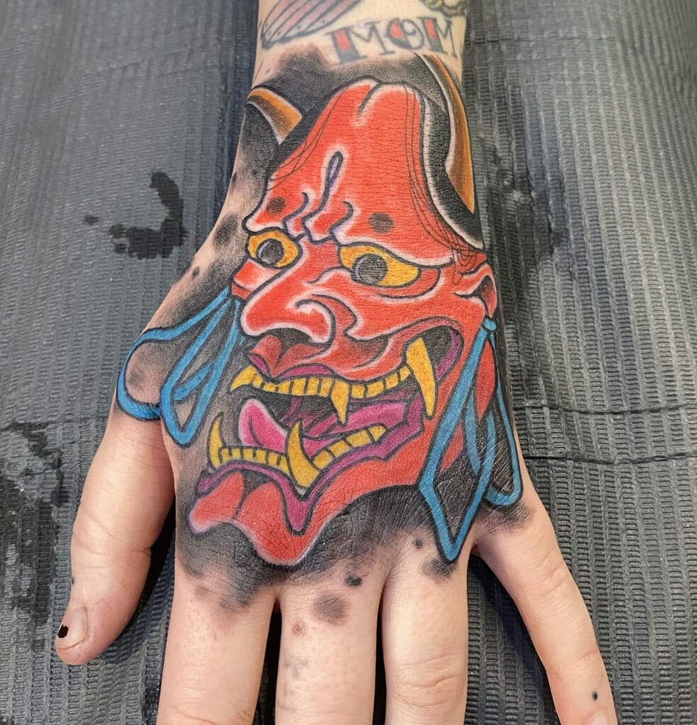 Tattoo of an Oni on a Hand