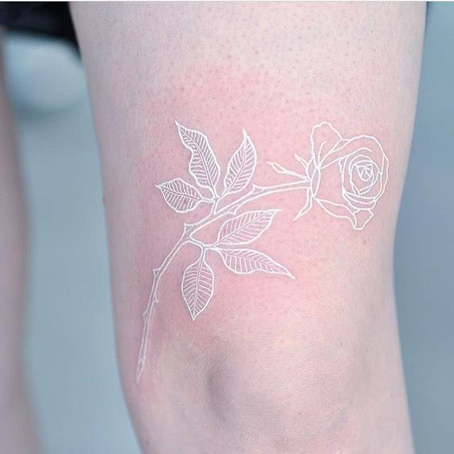 white ink tattoo